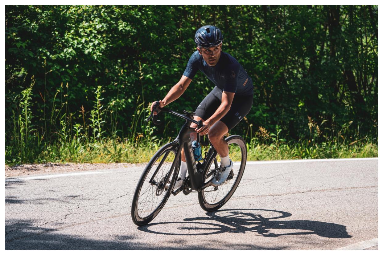  Sam Gupta perfects blue steel look while cornering on a Super Record Wireless equipped bike 