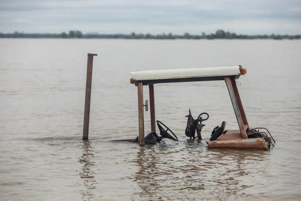 Farm equipment is nearly submerged in flood water in north Issaquena County in 2019.