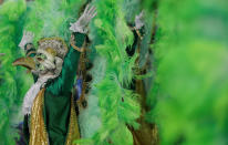 <p>A reveller from Imperatriz samba school performs during the second night of the Carnival parade at the Sambadrome in Rio de Janeiro, Brazil, Feb. 13, 2018. (Photo: Ricardo Moraes/Reuters) </p>