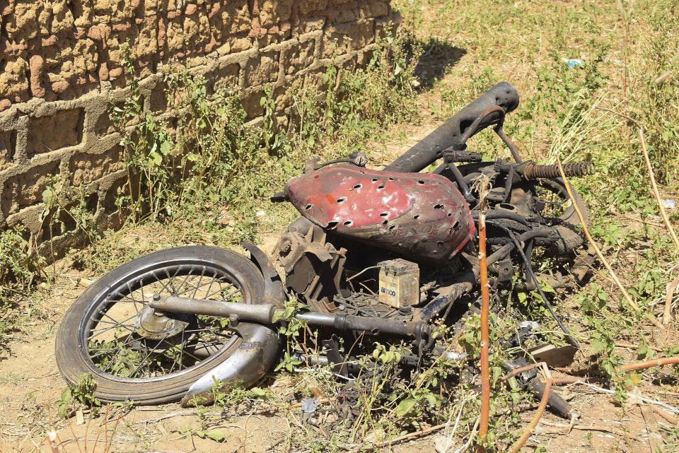 FILE - The remain of a motorcycle lie on the ground following an army drone attack at Tudun Biri village Nigeria, on Dec. 5, 2023. Two Nigerian military personnel will face a court martial over the killing of 85 villagers in a military drone attack in December in the West African nation’s conflict-battered north, authorities said on Thursday May 2, 2024. (AP Photo Kehinde Gbenga, File)
