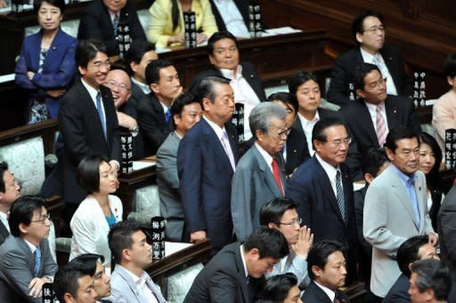 Former Democratic Party of Japan leader Ichiro Ozawa (C) attends a lower house plenary session of the National Diet, or parliament, in Tokyo on June 26, 2012. Lawmakers in Japan voted in favour of doubling sales tax, but a sizeable rebellion by members of the ruling party left Prime Minister Yoshihiko Noda's future in doubt. AFP PHOTO / KAZUHIRO NOGI