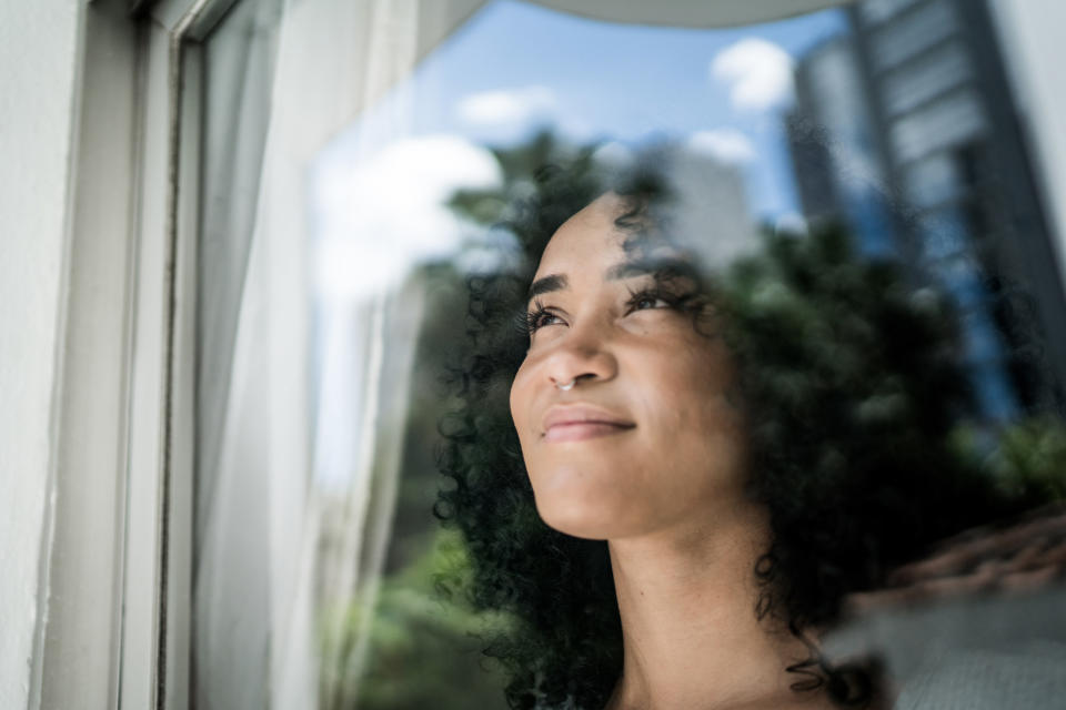 A woman looking out of the window