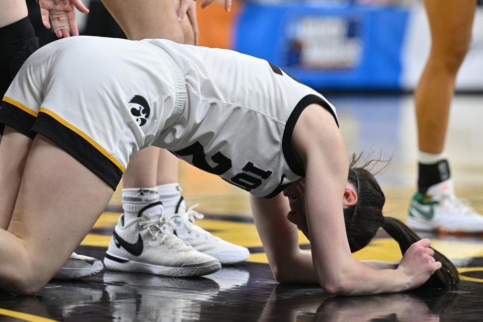 Caitlin Clark reacts after an intentional foul.