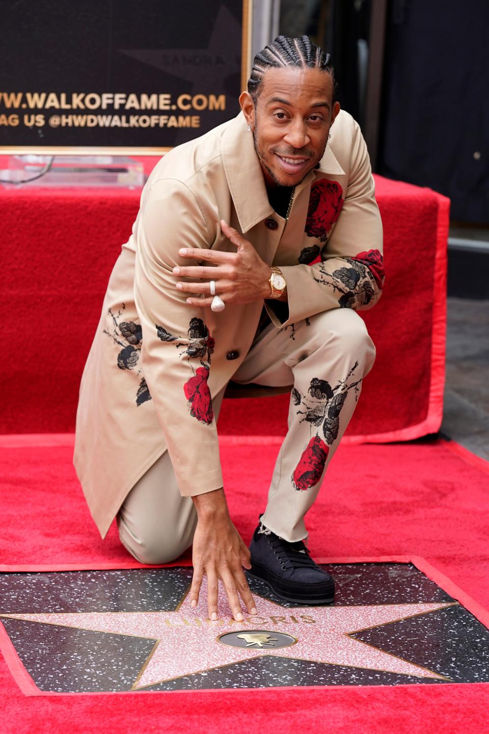 Ludacris poses during a ceremony honoring him with a star on the Hollywood Walk of Fame Thursday, May 18, 2023, in Los Angeles. (AP Photo/Chris Pizzello) ORG XMIT: CAMT115