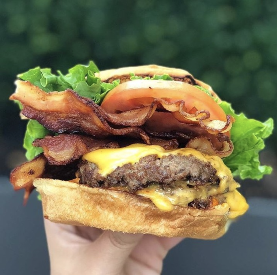 <p>If you're looking for a burger, but not just any ol' burger, look no further than <a href="https://burgerfi.com/?_ga=2.185728352.899010323.1557776851-1132005597.1557776851" rel="nofollow noopener" target="_blank" data-ylk="slk:Burgerfi;elm:context_link;itc:0;sec:content-canvas" class="link ">Burgerfi</a>. The self-titled gourmet burger joint offers a unique spin on the American classic. Take, for example, the Street Stack, which features griddled corn cakes, an all-natural black angus patty, melted white cheddar and mozzarella cheeses, smoky bacon and jalapeño pico de gallo for $10. Pick one of these bad boys up at any of their 106 restaurants nationwide. </p><p>Photo: Instagram/<a href="https://www.instagram.com/p/Bv11nV8DOzU/" rel="nofollow noopener" target="_blank" data-ylk="slk:burgerfi;elm:context_link;itc:0;sec:content-canvas" class="link ">burgerfi</a></p>