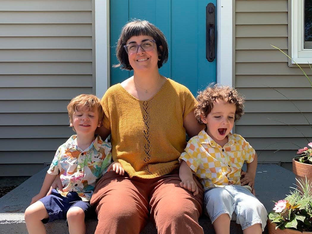 Woman with her twin sons