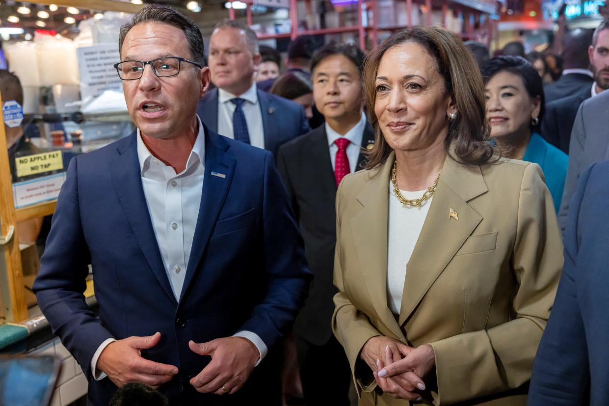 U.S. Vice President Kamala Harris and Pennsylvania Governor Josh Shapiro visit the Reading Terminal Market in Philadelphia, Pennsylvania, U.S., July 13, 2024. REUTERS/Kevin Mohatt