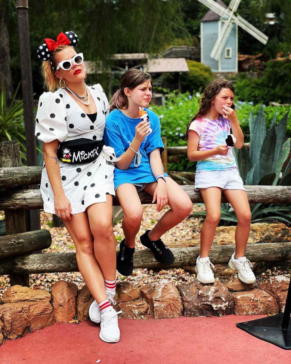 <p>"Humid-est Place on Earth!" the Girls5Eva star joked of her recent trip to Walt Disney World in hot and sunny Florida with her two daughters: Birdie, 12, and Cricket, 7. "Oh @waltdisneyworld it was so so nice to be back!" <a href="https://www.instagram.com/p/CQZgxYPBHKH/" rel="nofollow noopener" target="_blank" data-ylk="slk:wrote the actress;elm:context_link;itc:0;sec:content-canvas" class="link ">wrote the actress</a>, who sported Minnie Mouse ears and a Mickey Mouse manicure and fanny pack.</p>