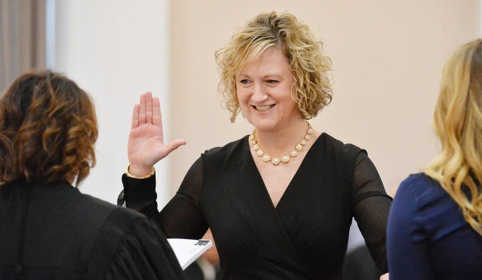 Elizabeth Hirz is sworn in as Erie County district attorney on Tuesday.