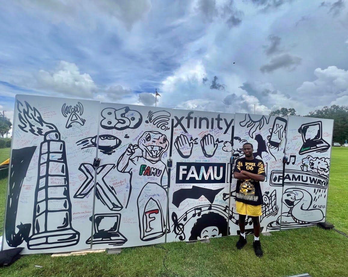Florida A&M University graduate and artist Elijah Rutland was on FAMU's campus on Friday, Aug. 26, 2022 to display a mural he created in partnership with Xfinity's HBCU Tour.