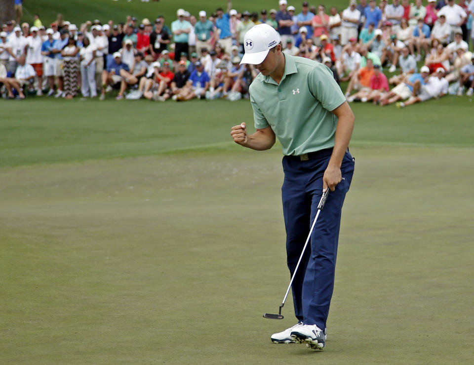 Jordan Spieth pumps his fist after a birdie putt on the second hole during the fourth round of the Masters golf tournament Sunday, April 13, 2014, in Augusta, Ga. (AP Photo/Matt Slocum)