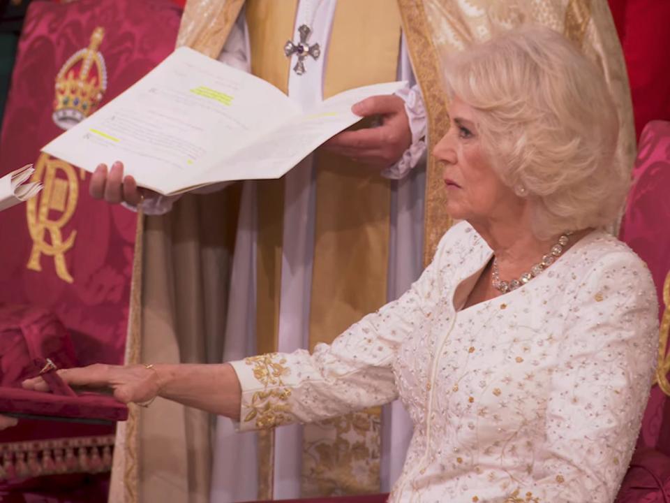 Queen Camilla receives the royal ring during her coronation ceremony.
