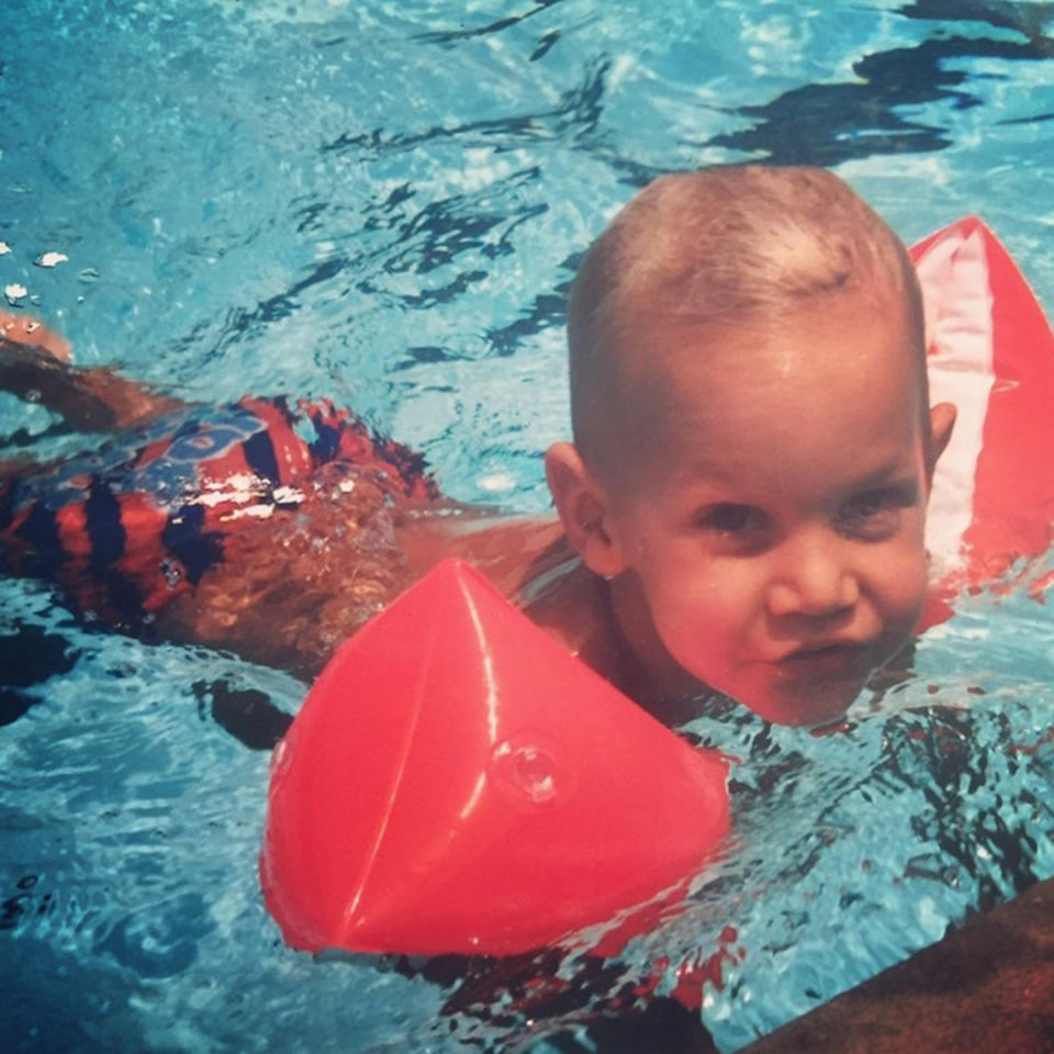 <p>From floaties to first place! Who did this little fish grow up to be? </p>