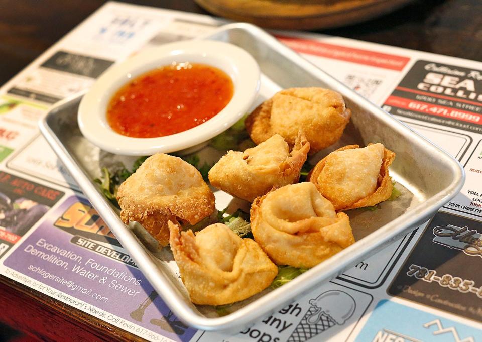 Lobster Rangoon with sweet chili sauce is on the menu at Off the Hook in the Houghs Neck neighborhood of Quincy.