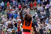 Serena Williams waves to the crowd after her match against Sabine Lisicki (not pictured) on day ten of the Miami Open at Crandon Park Tennis Center. Williams won 7-6 (4), 1-6, 6-3. Mandatory Credit: Geoff Burke-USA TODAY Sports