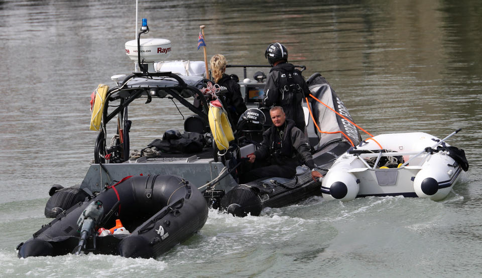 Small boats thought to be used by migrants are towed into Dover, Kent, by Border Force officers on Thursday. (PA)