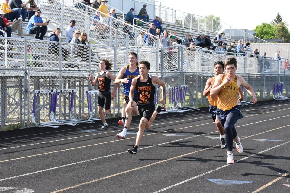 Hudson's Steven Valdez runs in the 100-meter dash at the LCAA championships held in Onsted on Tuesday..