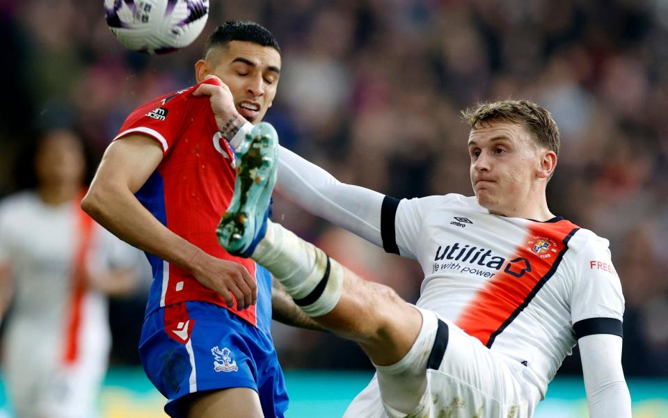 Alfie Doughty clears the ball