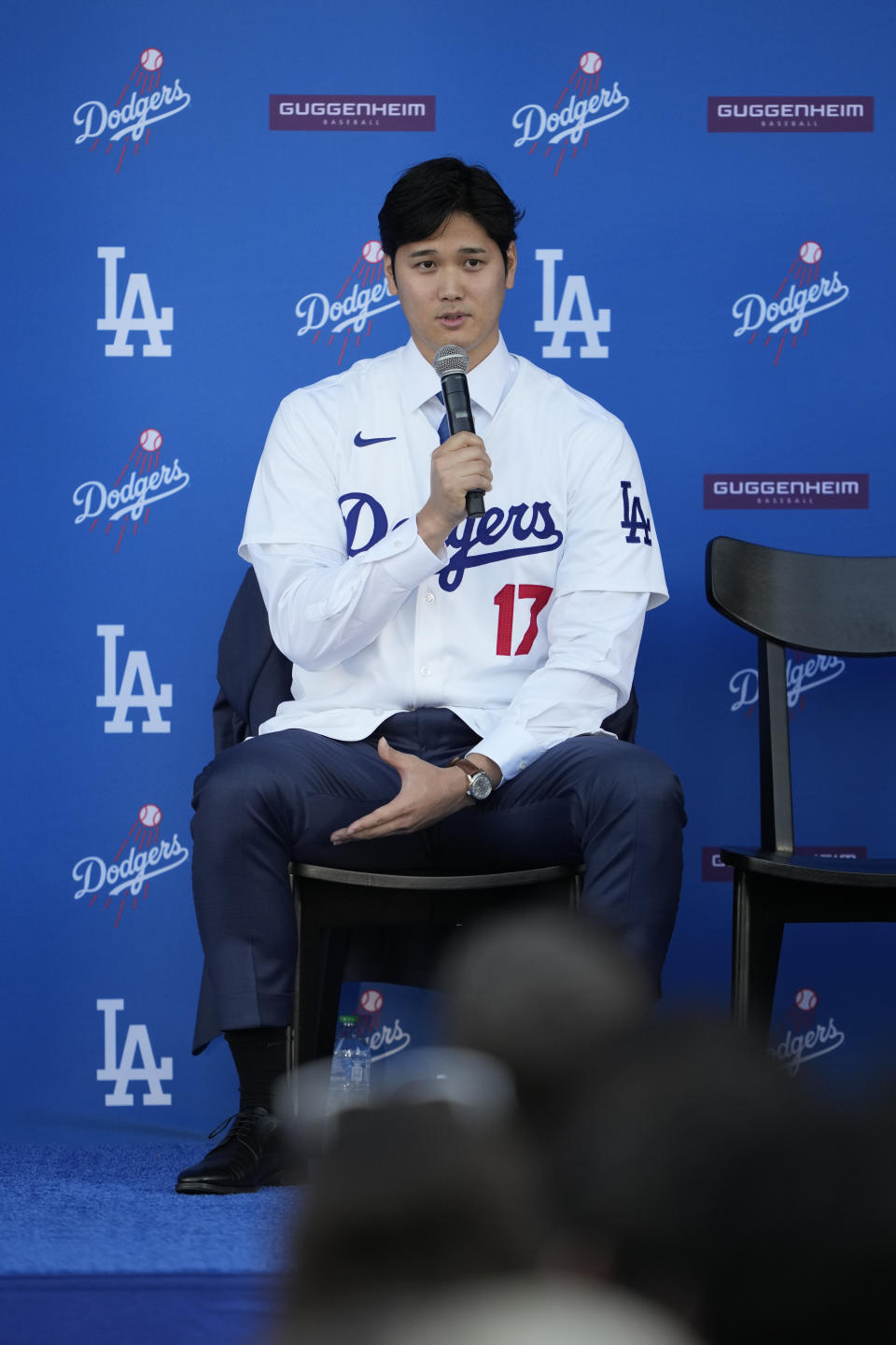 Los Angeles Dodgers' Shohei Ohtani answers questions during a baseball news conference at Dodger Stadium Thursday, Dec. 14, 2023, in Los Angeles. (AP Photo/Ashley Landis)