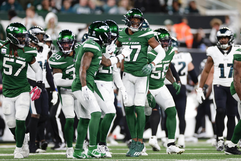 New York Jets' Bryce Hall (37), center celebrates after intercepting Philadelphia Eagles quarterback Jalen Hurts during the second half of an NFL football game, Sunday, Oct. 15, 2023, in East Rutherford, N.J. (AP Photo/Adam Hunger)