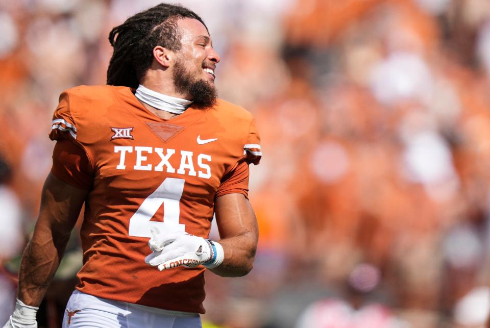 Texas Longhorns wide receiver Jordan Whittington (4) celebrates a win at the end of the game over Iowa State Cyclones 24-21 at Darrell K Royal–Texas Memorial Stadium during an NCAA college football game, Saturday, Oct. 16, 2022, in Austin, Texas.