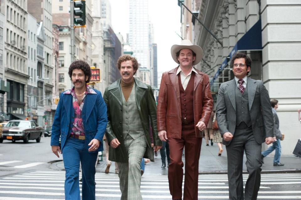 This image released by Paramount Pictures shows, from left, Paul Rudd is Brian Fantana, Will Ferrell is Ron Burgundy, David Koechner is Champ Kind and Steve Carell is Brick Tamland in a scene from "Anchorman 2: The Legend Continues." (AP Photo/Paramount Pictures, Gemma LaMana)