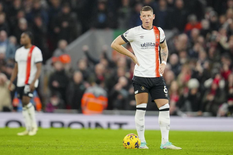 Luton Town's Ross Barkley is dejected after Liverpool's third goal during the English Premier League soccer match between Liverpool and Luton Town, at Anfield stadium in Liverpool, England, Wednesday, Feb. 21, 2024. (AP Photo/Jon Super)