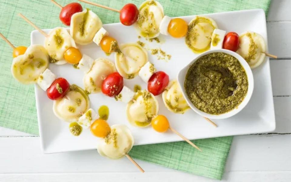 <p>Parade</p><p>Use frozen or refrigerated ravioli for this Italian-inspired snack.</p><p><strong>Get the recipe: <a href="https://parade.com/842186/communitytable/mini-ravioli-skewers/" rel="nofollow noopener" target="_blank" data-ylk="slk:Mini Ravioli Skewers;elm:context_link;itc:0;sec:content-canvas" class="link ">Mini Ravioli Skewers</a></strong></p>