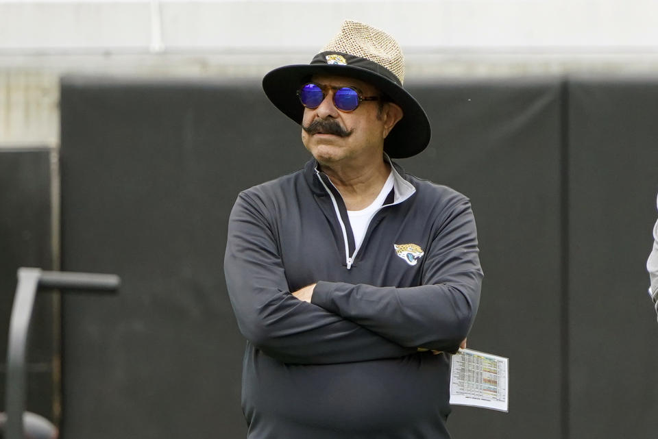 FILE - Jacksonville Jaguars owner Shad Khan watches players practice at NFL football rookie minicamp, Saturday, May 14, 2022, in Jacksonville, Fla. The Jaguars endured one of the most tumultuous coaching tenures in NFL history, with owner Shad Khan ultimately firing three-time national championship-winning coach Urban Meyer after 13 games and countless missteps — including one that resulted in a lawsuit. wld(AP Photo/John Raoux, Filer)