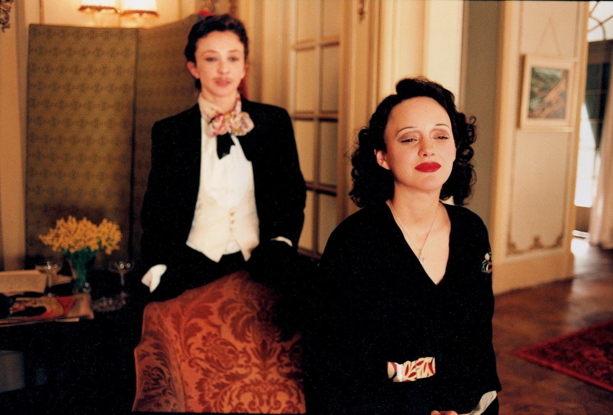 Marion Cotillard (right, with Sylvie Testud) stars as singer Edith Piaf in the musical drama "La Vie En Rose."