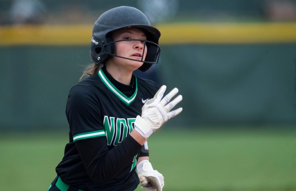 North’s McKenna English (2) races home as the North Huskies play the Harrison Warriors at North High School Wednesday, April 20, 2022.