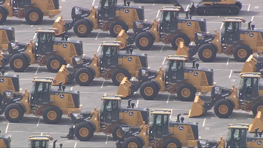 <em>John Deere front end loaders sit in Newport News Marine terminal after coming off a ship initially destined for Baltimore (WAVY Photo/Chris Wynn)</em>