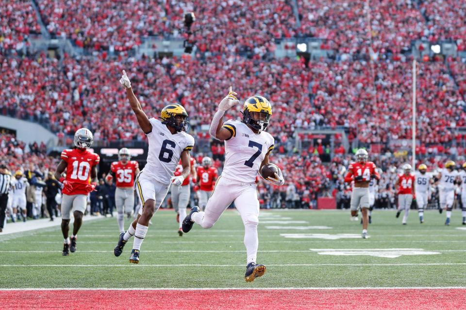 Michigan running back Donovan Edwards (7) runs for a touchdown against Ohio State during the second half at Ohio Stadium in Columbus, Ohio, on Saturday, Nov. 26, 2022.