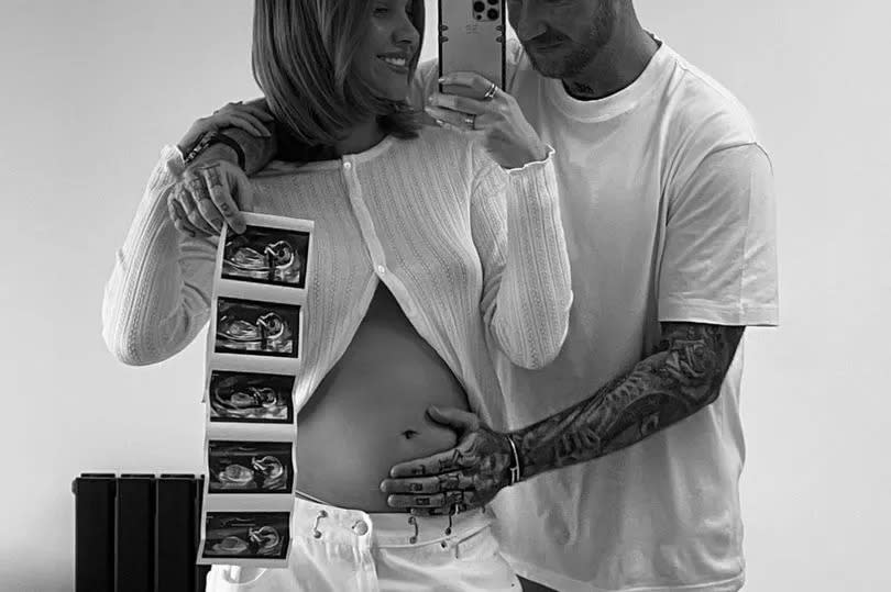 Emily shared an adorable picture flashing her tiny bump, as she captioned it: "Excited for the next chapter..."