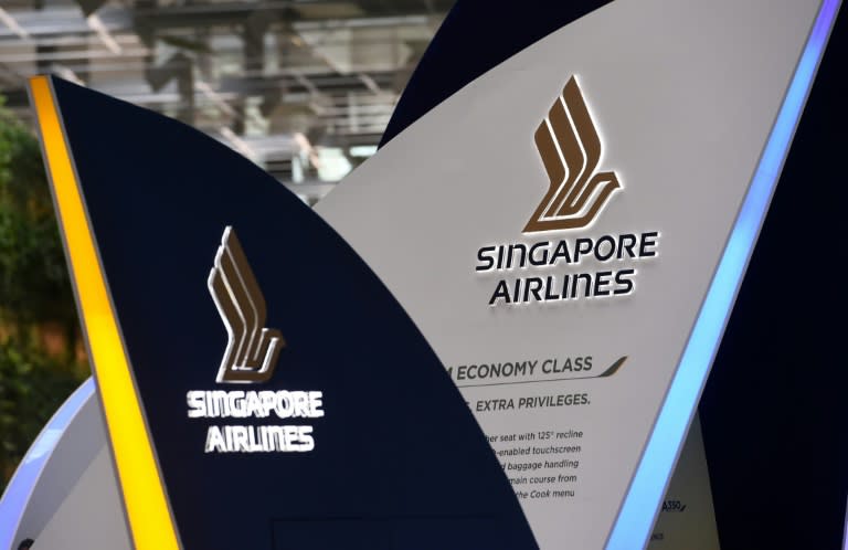 Singapore Airlines says group net profit for the first quarter nearly tripled from the previous year