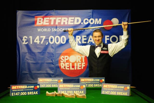 Stephen Hendry celebrates his 147 break in 2012