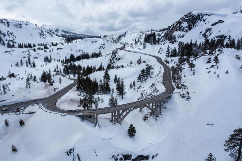 An aerial view of the Donner Summit Bridge on Old Highway 40 Wednesday, March 6, 2024, shows all the snowfall from recent storms.