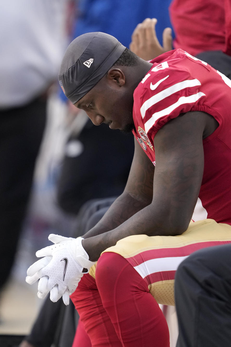 San Francisco 49ers wide receiver Deebo Samuel sits on the bench during the second half of an NFL football game against the Arizona Cardinals in Santa Clara, Calif., Sunday, Nov. 7, 2021. (AP Photo/Tony Avelar)