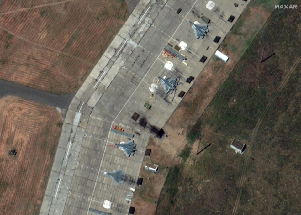 A satellite image captured by Maxar shows three Su-57 Felon aircraft on the apron at Akhtubinsk airfield in Russia on June 7 before the Ukrainian drone attack. <em>Satellite image ©2024 Maxar Technologies</em>