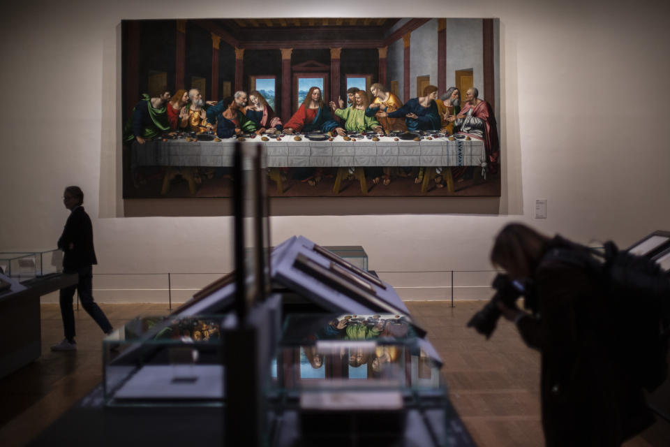 The Last Supper by Leonardo da Vinci displayed at the Louvre museum Sunday, Oct. 20, 2019 in Paris. A unique group of artworks is displayed at the Louvre museum in addition to its collection of paintings and drawings by the Italian master. The exhibition opens to the public on Oct.24, 2019. (AP Photo/Rafael Yaghobzadeh)