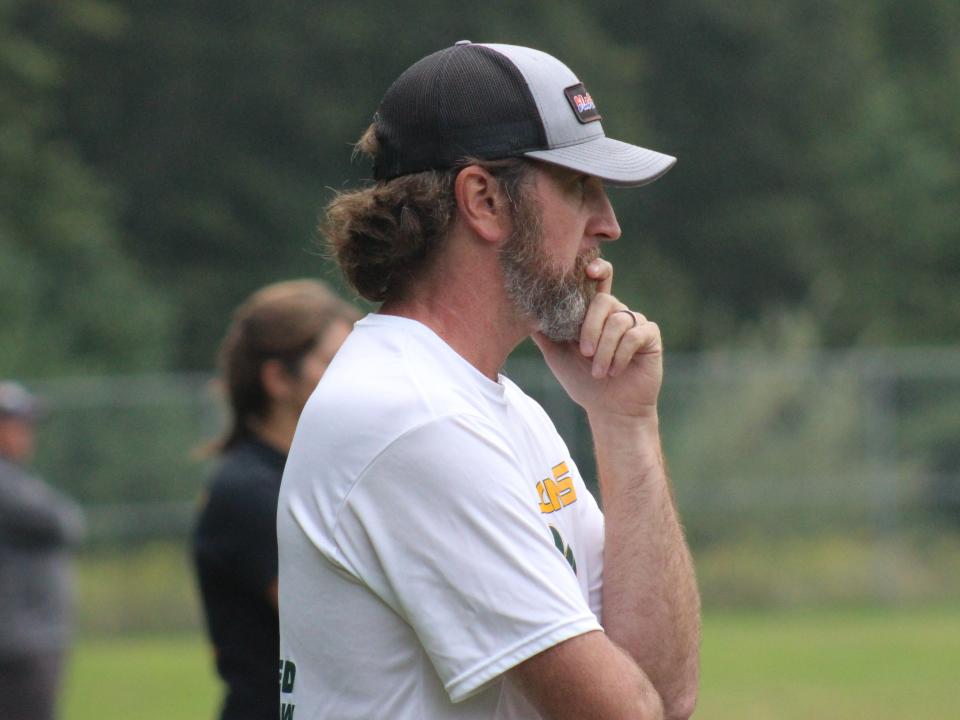 Dighton-Rehoboth girls soccer coach Mike Cooke watches on during a game against Apponequet.