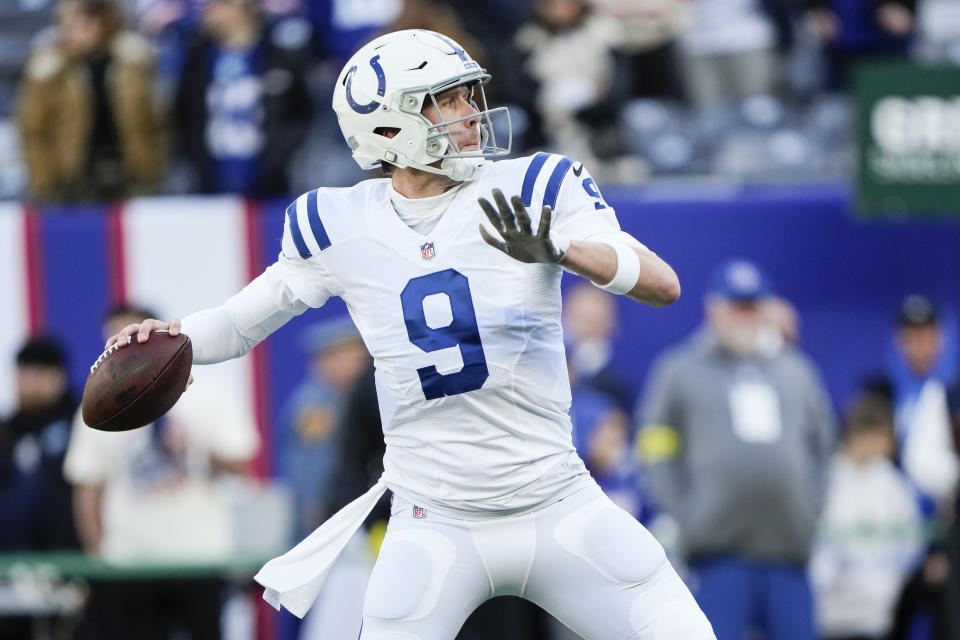 FILE - Indianapolis Colts quarterback Nick Foles (9) warms up before an NFL football game against the New York Giants on Jan. 1, 2023, in East Rutherford, N.J. The Colts released Foles on Friday, May 5, 2023, saving about $2 million in salary cap space while creating room for the 12 rookies it added last week in the draft. (AP Photo/Bryan Woolston, File)