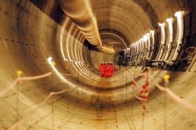 Embargoed to 0001 Friday January 24File photo dated 19/11/13 of Crossrail workers inspecting the first completed section of Crossrail tunnel as the taxpayer will have to cover a ?160 million shortfall in private-sector funding for London's Crossrail project after the Department for Transport (DfT) failed to secure the expected contribution from Heathrow Airport, a new report has revealed. PRESS ASSOCIATION Photo. Issue date: Friday January 24, 2014. But the report from spending watchdog the National Audit Office (NAO) said the DfT has set aside a large enough contingency fund to cover the missing cash, and found that taxpayers' interests had been