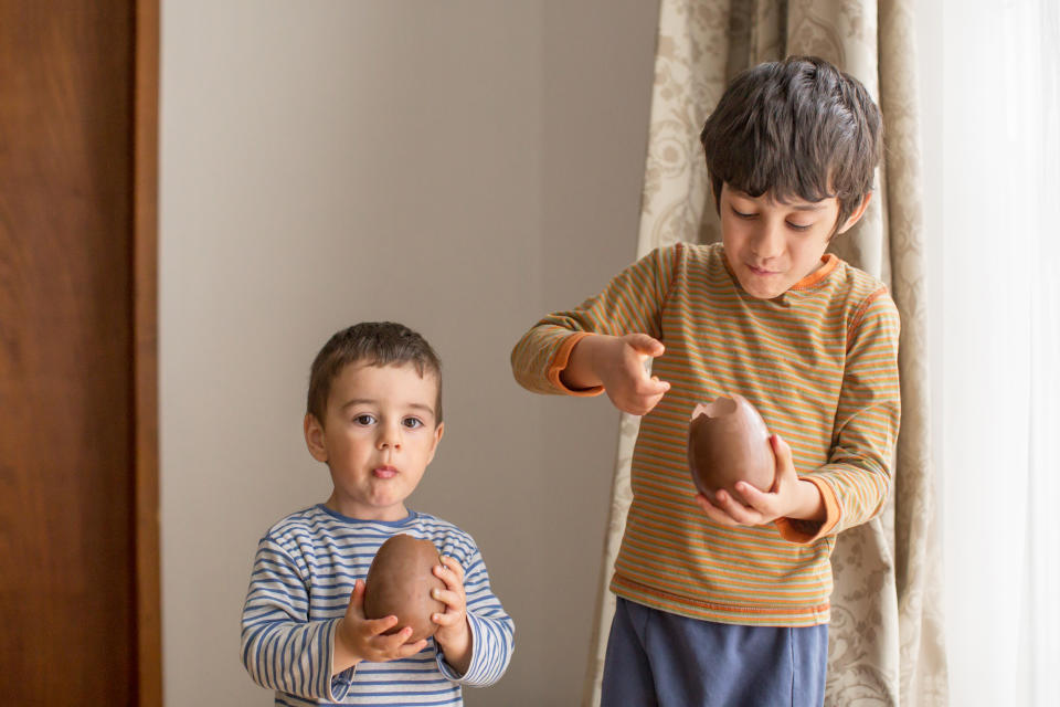 Children eating easter egg. (Getty Images)