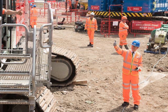 Transport Secretary Grant Shapps gives the signal for digging to begin