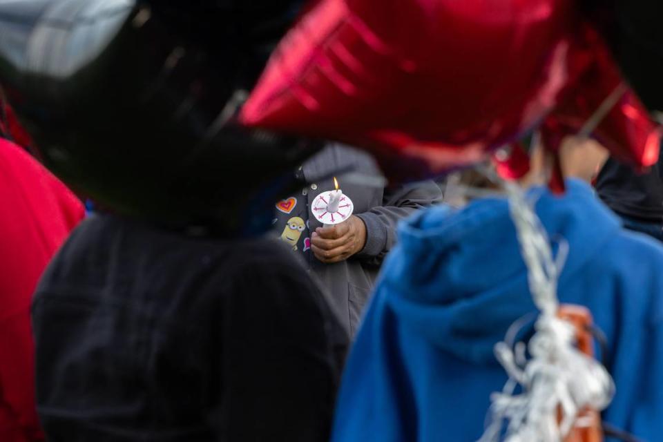 Friends and family of 13-year-old Jermel Ware, who recently passed away following a go-cart accident, held a candlelight vigil for Jermel in Belleville’s Jaycee Park Friday night.