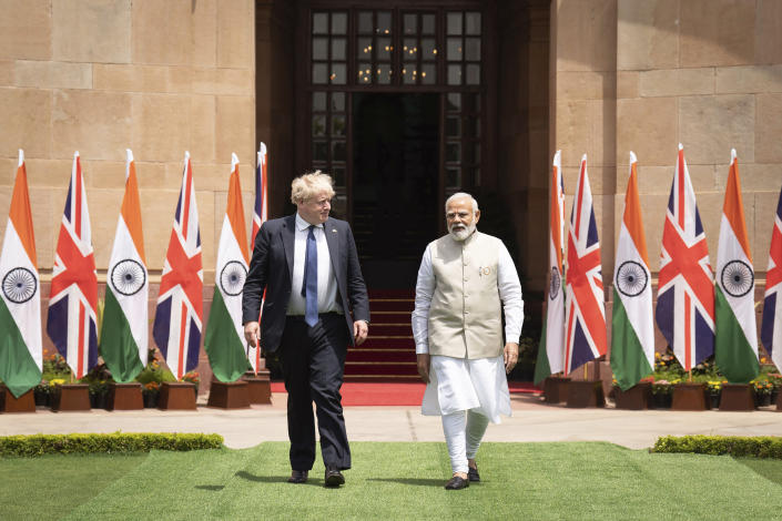 British Prime Minister Boris Johnson, left, meets Indian Prime Minister Narendra Modi at Hyderabad House in New Delhi Friday, April 22, 2022. (Stefan Rousseau/Pool Photo via AP)