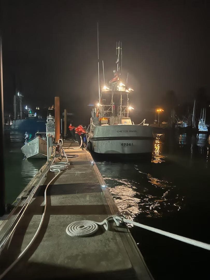 U.S. Coast Guard crews from Station Chetco River rescued two people from their boat after it capsized June 6 off the coast of Nesika Beach.