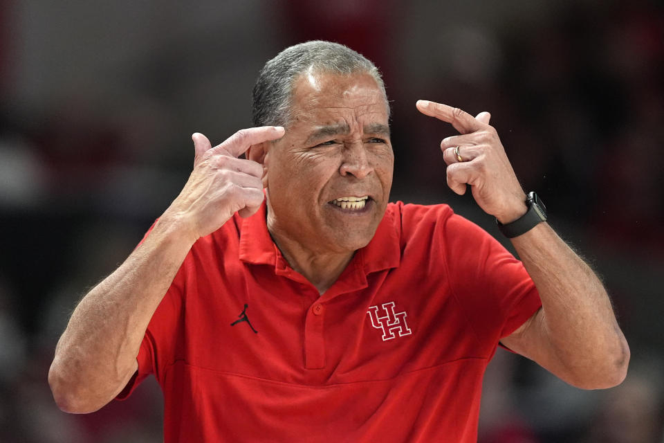 Houston coach Kelvin Sampson talks to his playes during the first half of an NCAA college basketball game against Kansas Saturday, March 9, 2024, in Houston. (AP Photo/David J. Phillip)