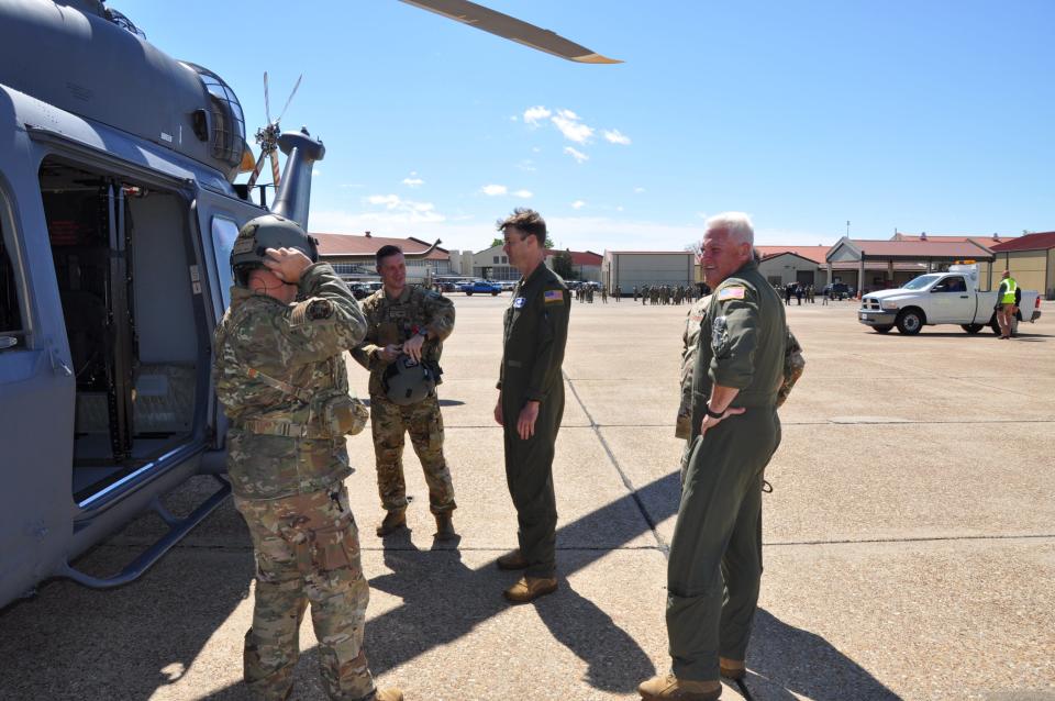 U.S. Air Force Col. Christopher Lacouture, 908th Airlift Wing commander, center, is joined by 908th Operations Group Commander, Col. Shane Devlin, right front, and 908th Maintenance Group Commander, Lt. Col. Stuart Martin, right rear, as they welcome the Eglin Air Force Base, Florida aircrew that dropped of the 908th’s first MH-139A Grey Wolf helicopter April 3, 2024, at Maxwell Air Force Base, Alabama. The arrival of the helicopter signifies a major step in the 908th’s transition from tactical airlift mission to becoming the formal training unit for the Grey Wolf.